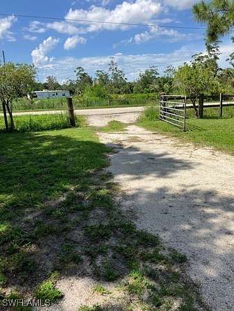 5 Acres of Residential Land with Home for Sale in Moore Haven, Florida