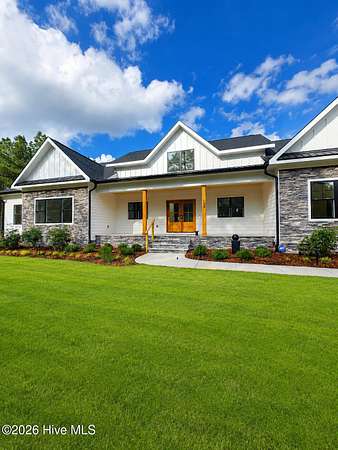 4.9 Acres of Land with Home for Sale in West End, North Carolina