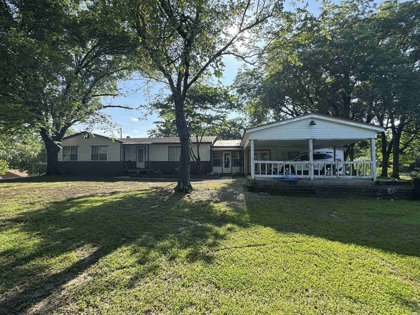 10 Acres of Residential Land with Home for Sale in Wickes, Arkansas