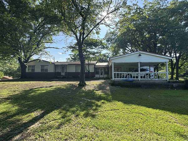 10 Acres of Residential Land with Home for Sale in Wickes, Arkansas