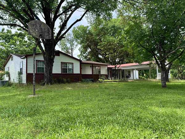 10 Acres of Land with Home for Sale in Wickes, Arkansas