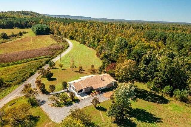 5.64 Acres of Residential Land with Home for Sale in Palmer, Tennessee