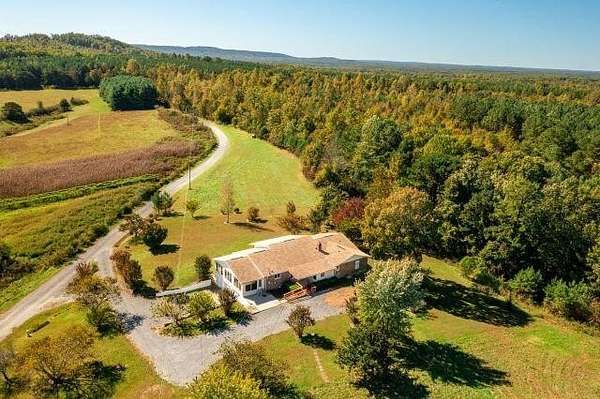 5.64 Acres of Residential Land with Home for Sale in Palmer, Tennessee