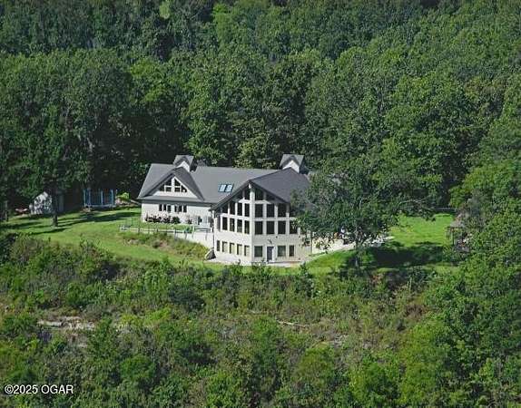 36 Acres of Land with Home for Sale in Southwest City, Missouri