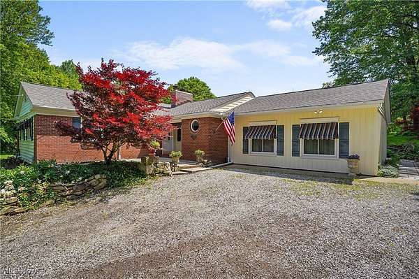 3.85 Acres of Residential Land with Home for Sale in Cuyahoga Falls, Ohio