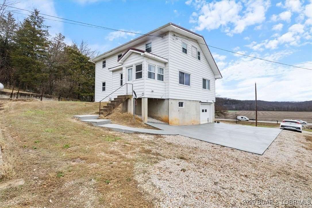 3 Acres of Residential Land with Home for Sale in Tuscumbia, Missouri