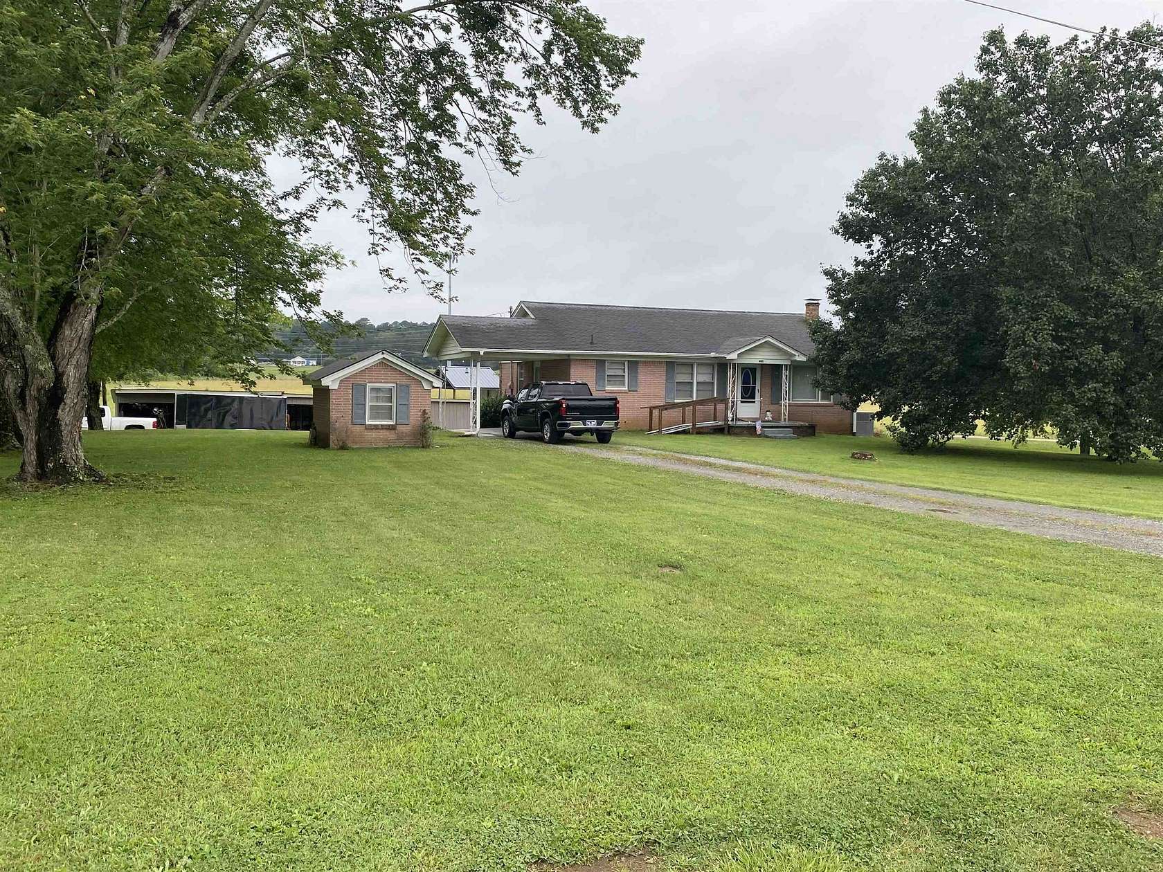 1.3 Acres of Land with Home for Sale in Savannah, Tennessee