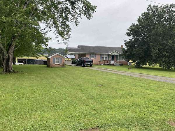 1.3 Acres of Land with Home for Sale in Savannah, Tennessee