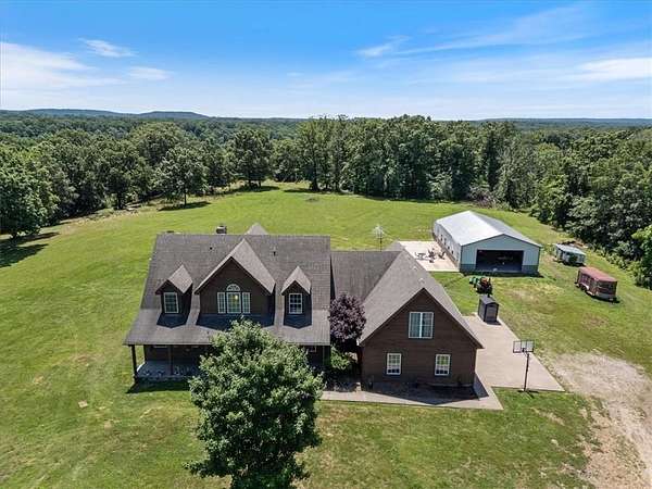 110 Acres of Land with Home for Sale in Washburn, Missouri