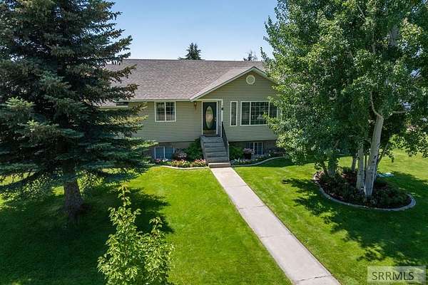 2 Acres of Residential Land with Home for Sale in Rigby, Idaho