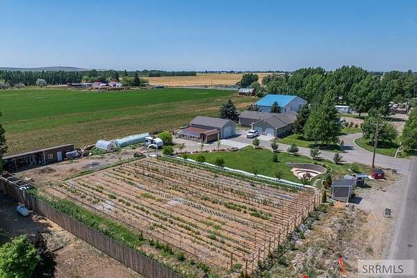 2 Acres of Residential Land with Home for Sale in Rigby, Idaho