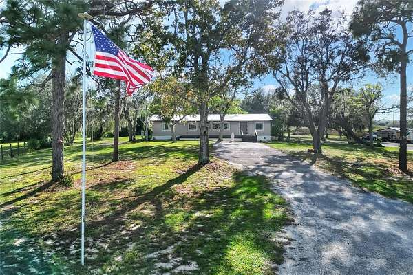 4.89 Acres of Residential Land with Home for Sale in Sebring, Florida