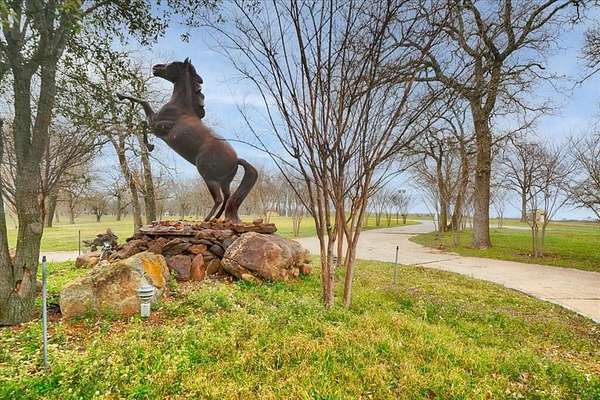 4.9 Acres of Residential Land with Home for Lease in Pilot Point, Texas