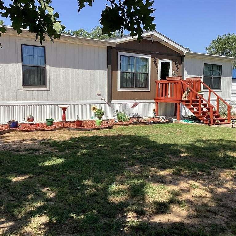 1.75 Acres of Residential Land with Home for Sale in Denison, Texas