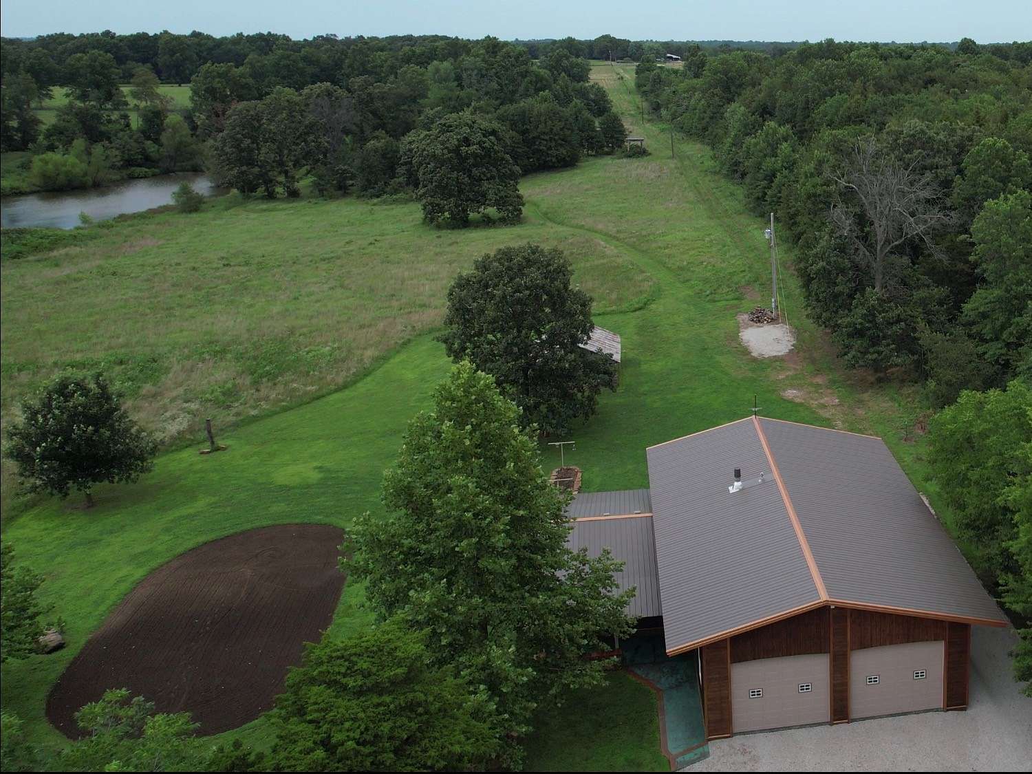 13.3 Acres of Land with Home for Sale in Lamar, Missouri