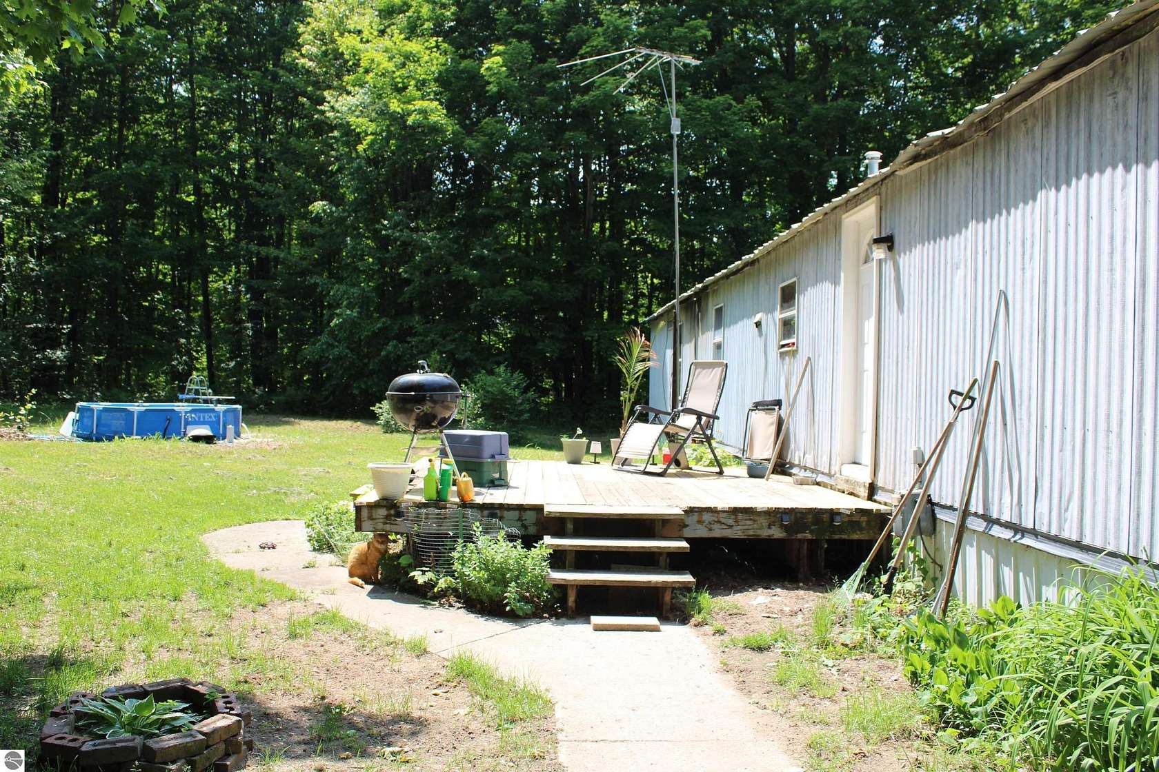 2.5 Acres of Residential Land with Home for Sale in Kalkaska, Michigan