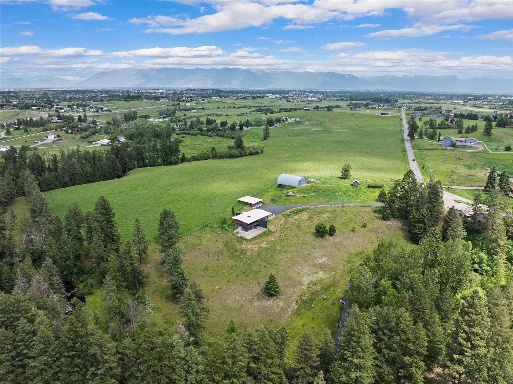 66.1 Acres of Land with Home for Sale in Kalispell, Montana