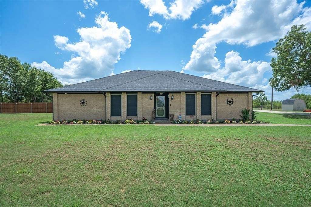 5.68 Acres of Residential Land with Home for Sale in Terrell, Texas