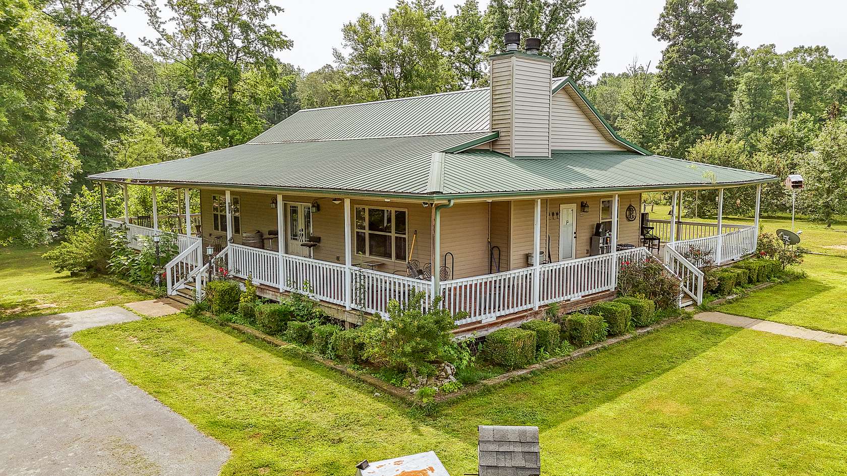 66.4 Acres of Land with Home for Sale in Hollow Rock, Tennessee