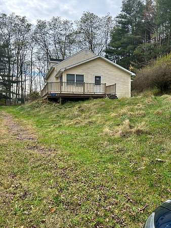 4 Acres of Residential Land with Home for Sale in Gilbertsville, New York