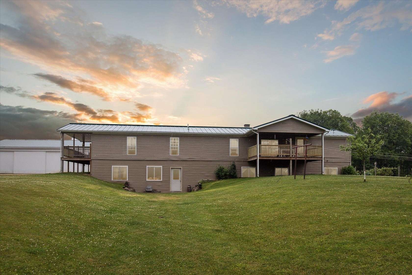 80 Acres of Land with Home for Sale in Tustin, Michigan