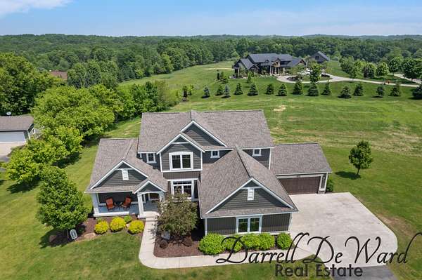 2.5 Acres of Residential Land with Home for Sale in Ada, Michigan