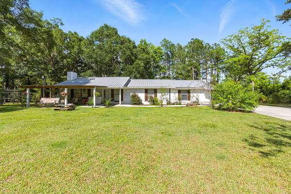 2.46 Acres of Residential Land with Home for Sale in Crestview, Florida