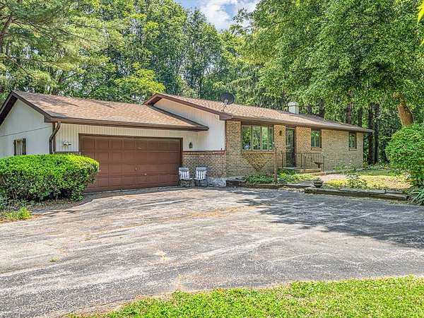 16.6 Acres of Land with Home for Sale in Rockford, Illinois