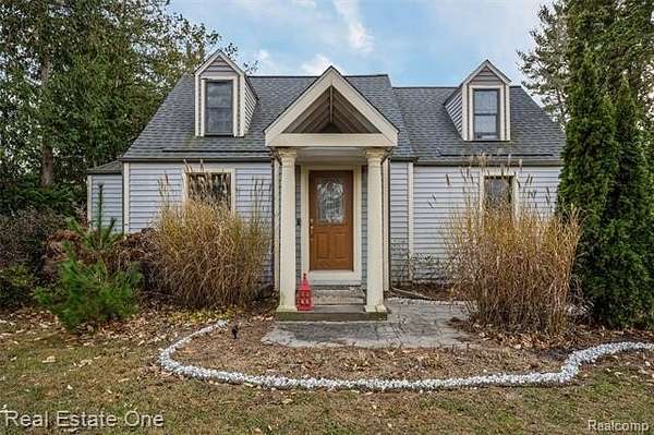 2 Acres of Residential Land with Home for Sale in Livonia, Michigan