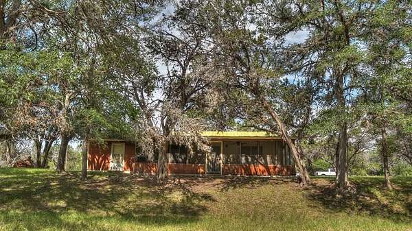 2.4 Acres of Residential Land with Home for Sale in Leakey, Texas