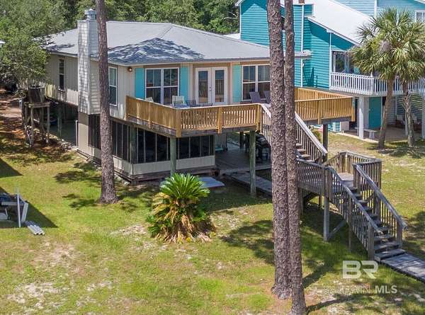 0.39 Acres of Residential Land with Home for Sale in Gulf Shores, Alabama