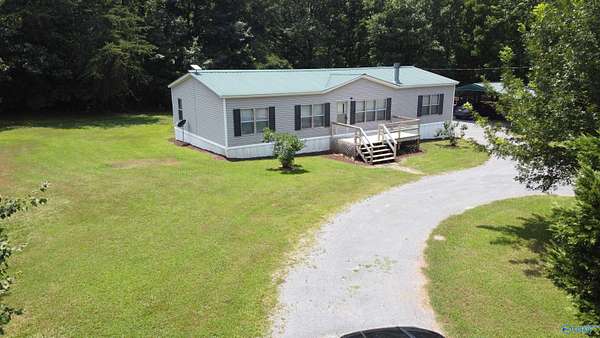 2.9 Acres of Residential Land with Home for Sale in Collinsville, Alabama