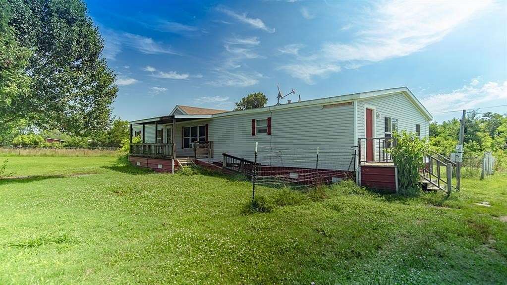 10 Acres of Residential Land with Home for Sale in Dike, Texas