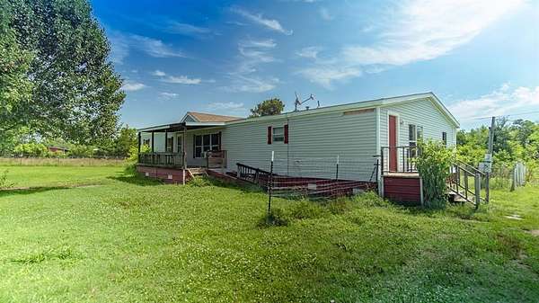 10 Acres of Residential Land with Home for Sale in Dike, Texas