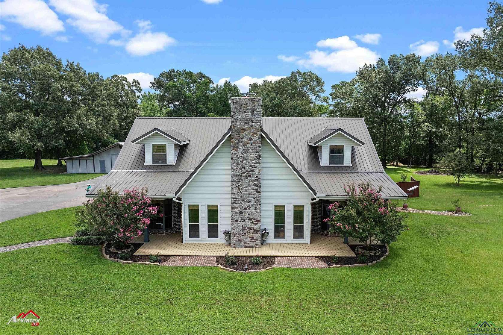 2.34 Acres of Residential Land with Home for Sale in Carthage, Texas