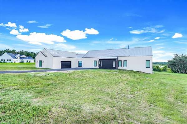 5 Acres of Residential Land with Home for Sale in Clermont, Florida