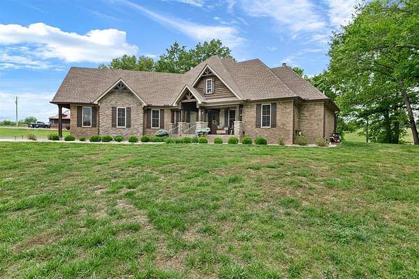 11.5 Acres of Land with Home for Sale in Scottsville, Kentucky