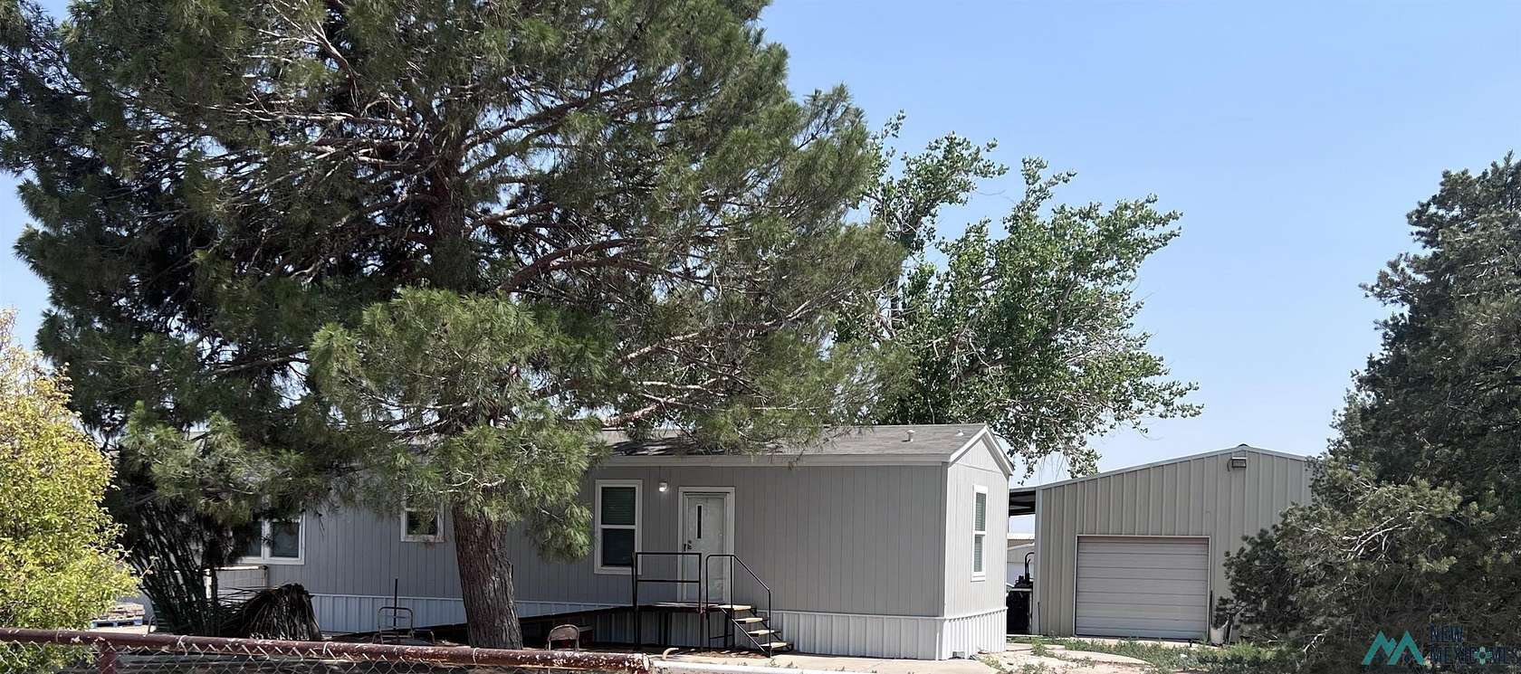 13.4 Acres of Land with Home for Sale in Artesia, New Mexico