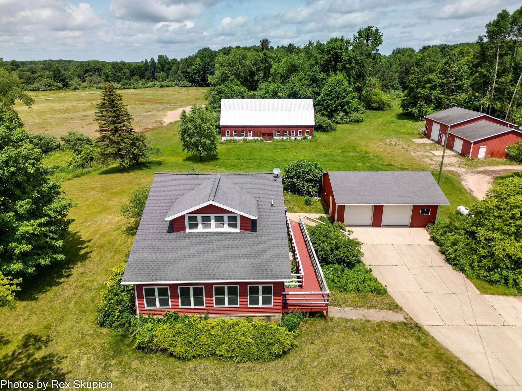 75.7 Acres of Land with Home for Sale in Grant, Michigan