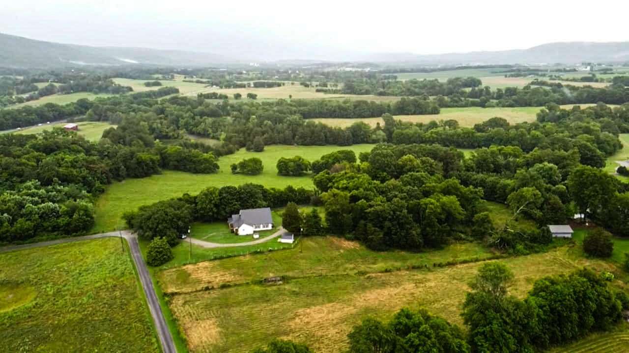 10.7 Acres of Land with Home for Sale in Pikeville, Tennessee