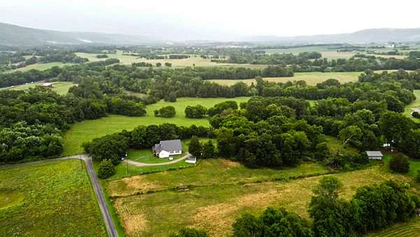 10.7 Acres of Land with Home for Sale in Pikeville, Tennessee