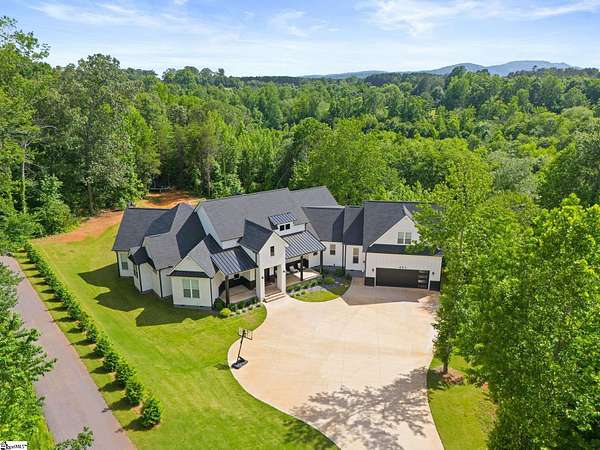 10 Acres of Residential Land with Home for Sale in Taylors, South Carolina