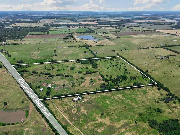 65.4 Acres of Land with Home for Sale in Wolfe City, Texas