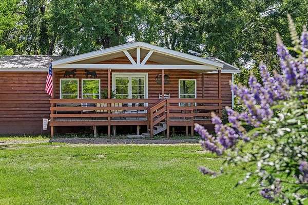 5 Acres of Residential Land with Home for Sale in Denison, Texas