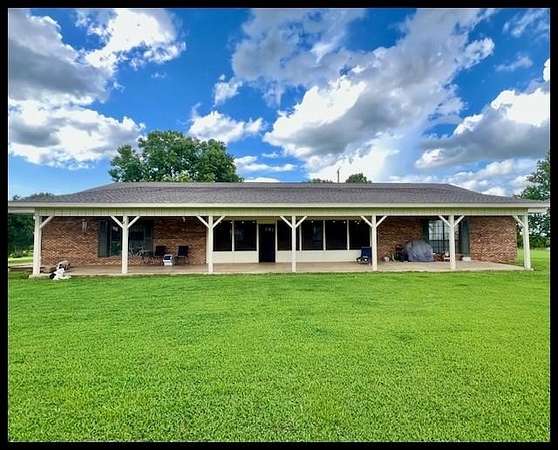 4.9 Acres of Land with Home for Sale in Sardis, Mississippi