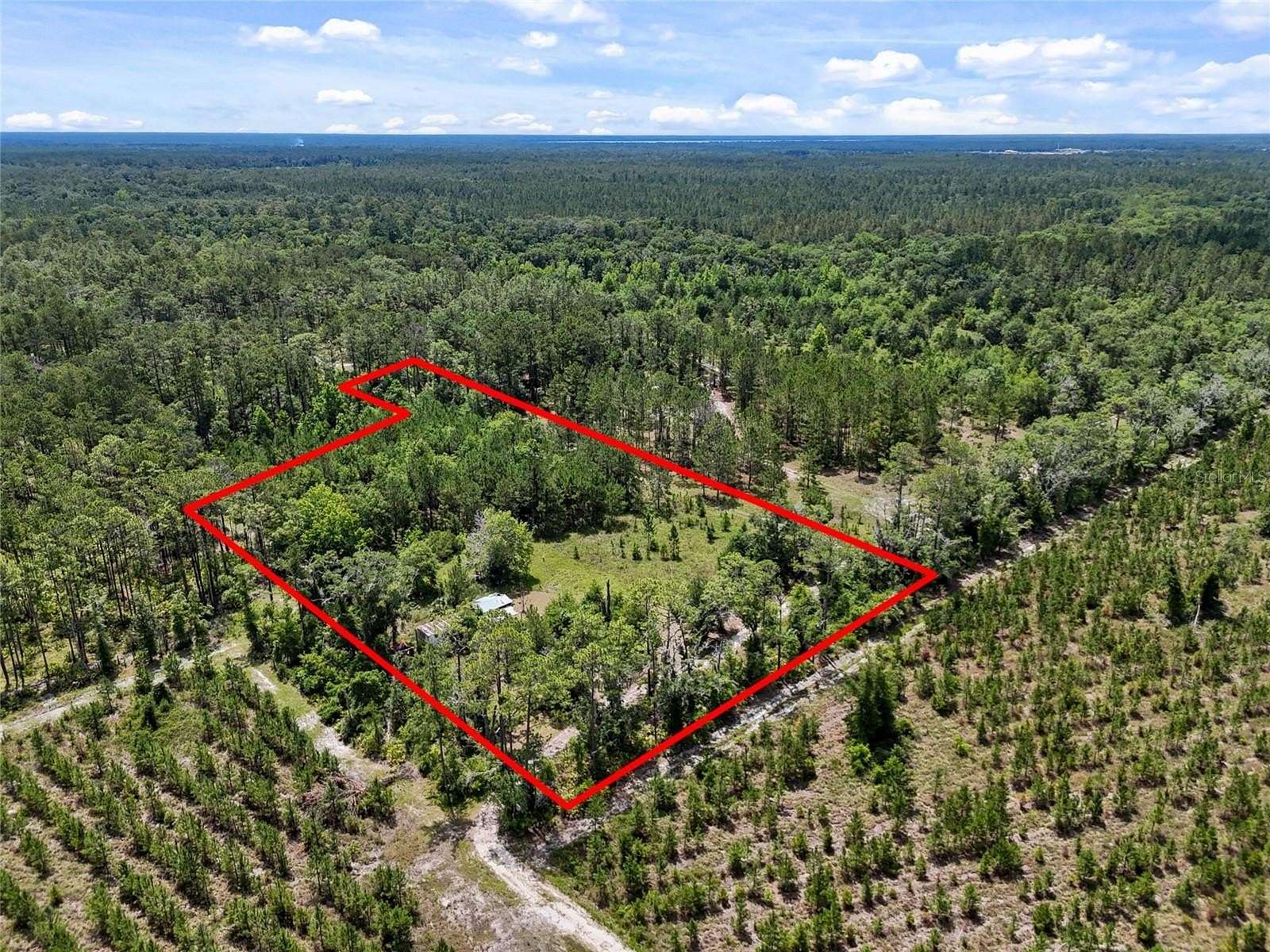 4 Acres of Residential Land with Home for Sale in Gainesville, Florida