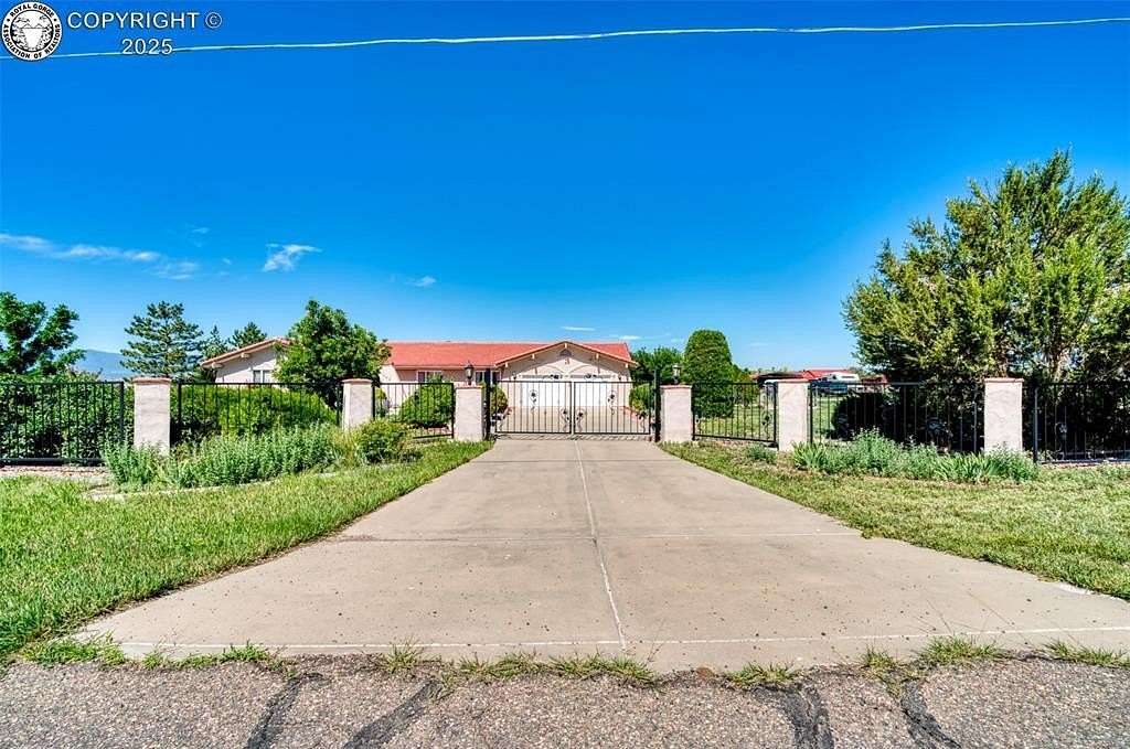 30 Acres of Agricultural Land with Home for Sale in Penrose, Colorado