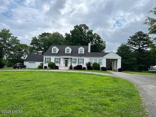 8.3 Acres of Residential Land with Home for Sale in Humboldt, Tennessee