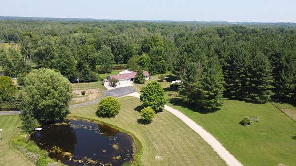 5.15 Acres of Residential Land with Home for Sale in Morley, Michigan