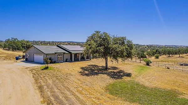 9.1 Acres of Land with Home for Sale in Raymond, California